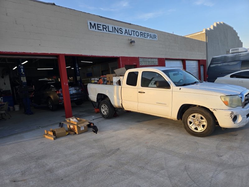 Merlin's Auto Repair & Sales - work in progress out front